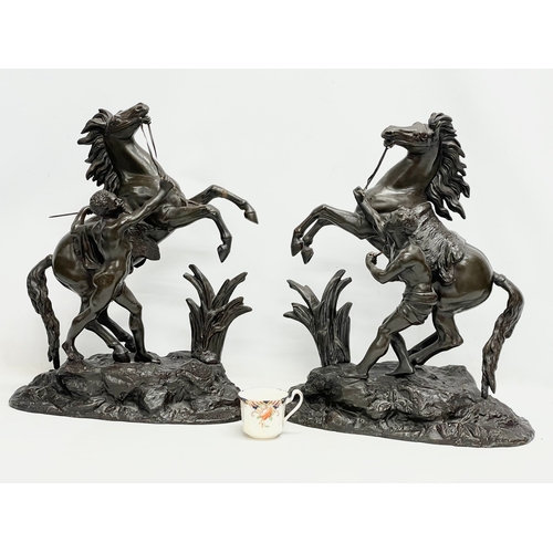 49 - A pair of large good quality late 19th century spelter Marly Horses. 42x22x52cm