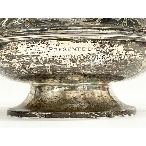 529 - A large silver presentation trophy. 708grams. Birmingham mark. 30x19x11cm.