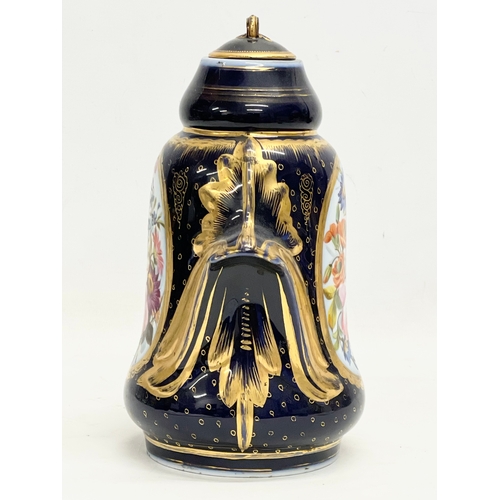 157 - An early 20th century German gilt colt blue porcelain urn. Converted from a lamp. 18x26cm.