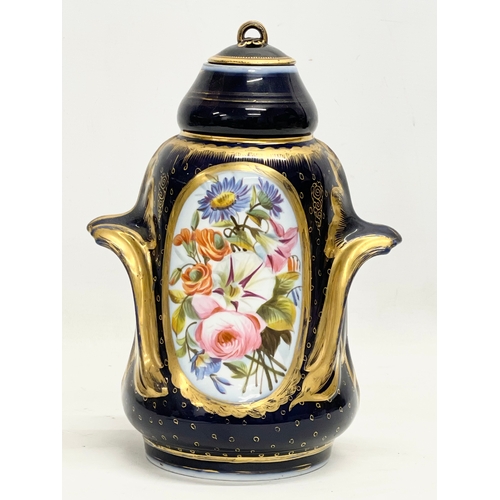 157 - An early 20th century German gilt colt blue porcelain urn. Converted from a lamp. 18x26cm.