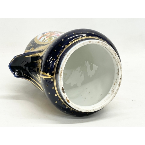 157 - An early 20th century German gilt colt blue porcelain urn. Converted from a lamp. 18x26cm.