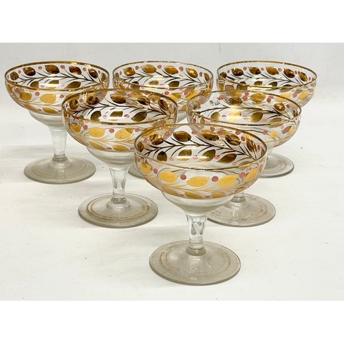 167 - 2 sets of vintage gilt drinking glasses. Cocktail glasses measure 10x10cm.