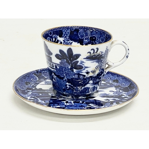 169 - A late 18th century Copeland Willow pattern porcelain cup and saucer.