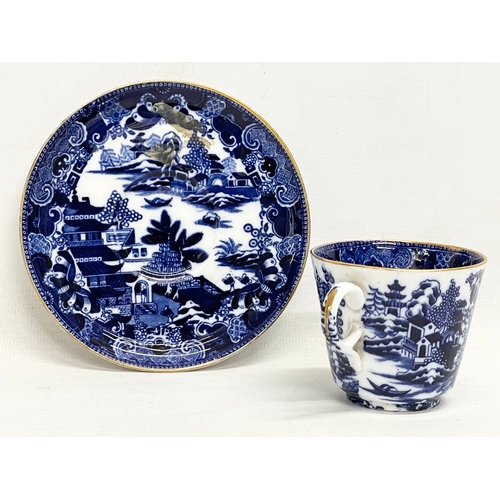 169 - A late 18th century Copeland Willow pattern porcelain cup and saucer.