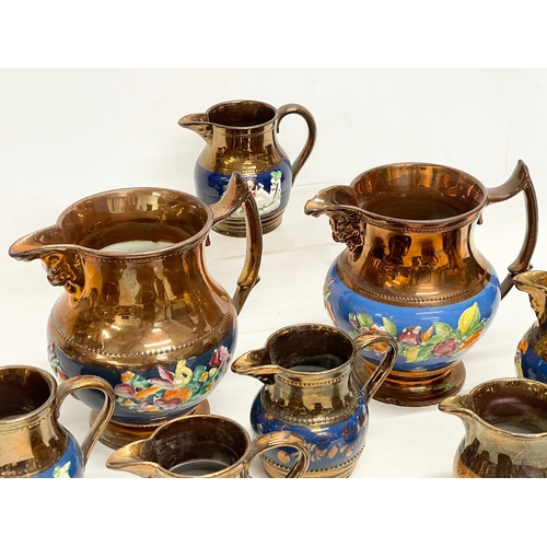 172 - A quantity of Victorian lustre jugs. Largest 16x17cm