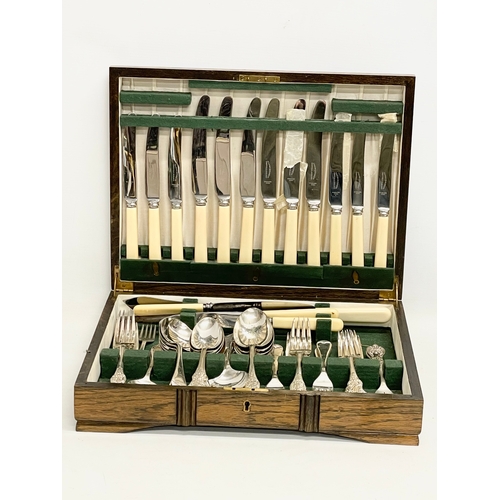 336 - A vintage canteen of silver plated and steel cutlery. 39x30x8cm