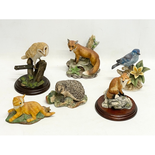 343 - A quantity of animal ornaments. Including Border Fine Arts, Aynsley etc.