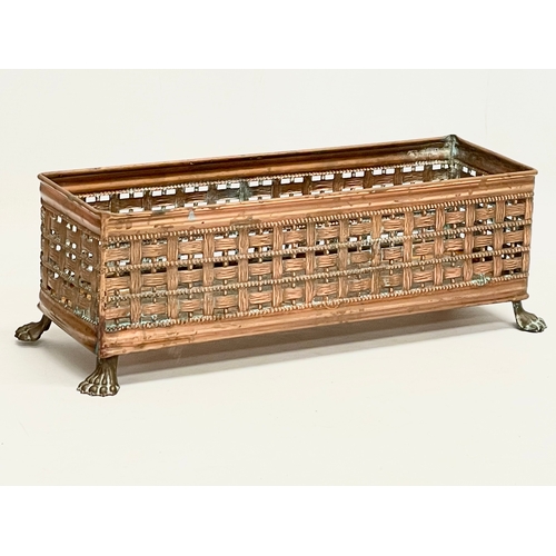 100 - An early 20th century copper planter. 1910. 33x12x11cm