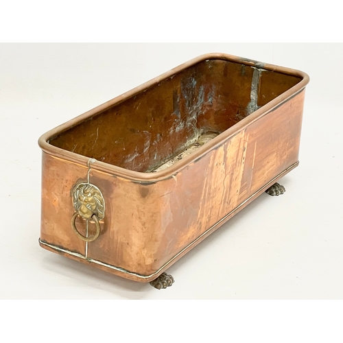 163 - An early 20th century copper planter. 47x13x14cm