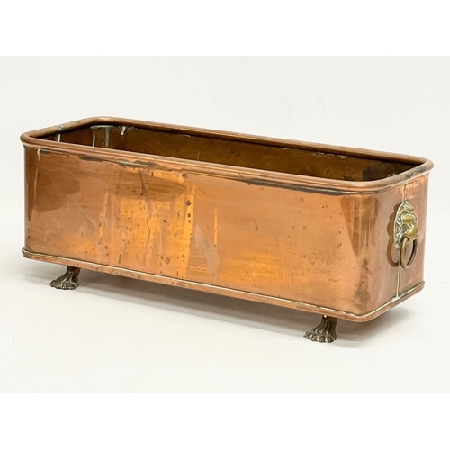 163 - An early 20th century copper planter. 47x13x14cm