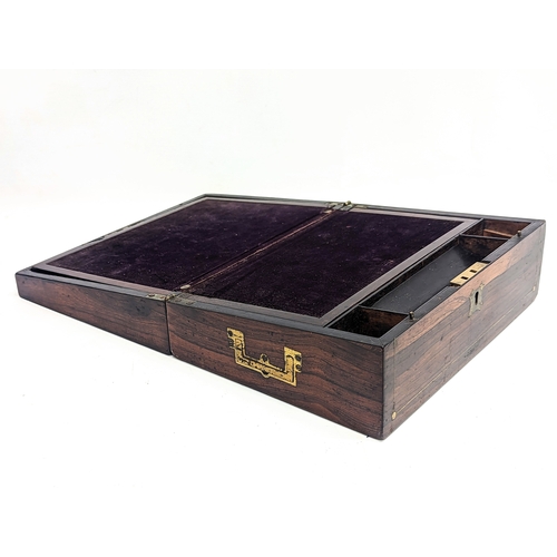 105 - A Victorian rosewood brass inlaid writing slope. 30.5x23.5x11.5cm