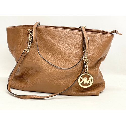 537 - A Michael Kors leather handbag.