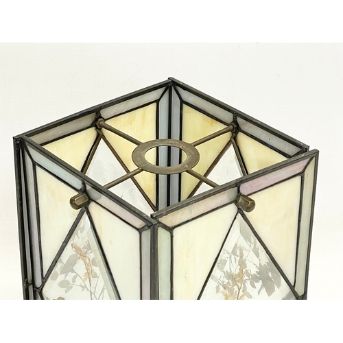 107 - A vintage stain and bevelled glass light shade. 15x15x25cm