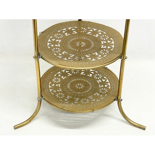 114 - A late 19th century brass 4 tier cake stand. 41x89cm