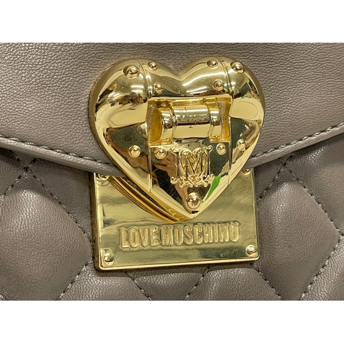 539 - A ladies leather Moschino handbag