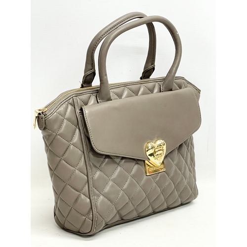 539 - A ladies leather Moschino handbag