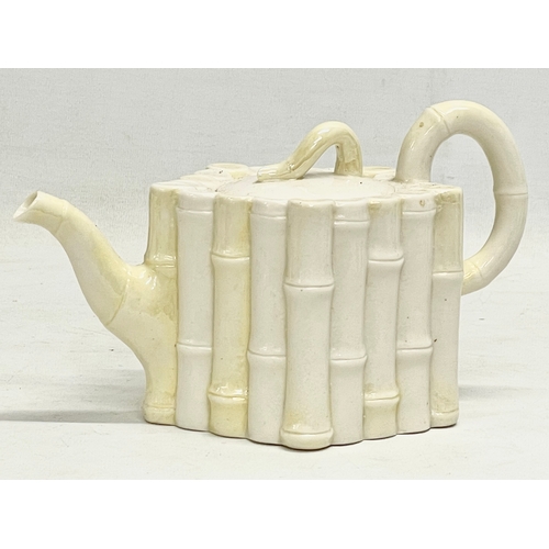 58 - A 1st Period Belleek Pottery Bamboo teapot. 21x12.5cm