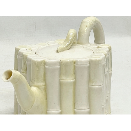 58 - A 1st Period Belleek Pottery Bamboo teapot. 21x12.5cm