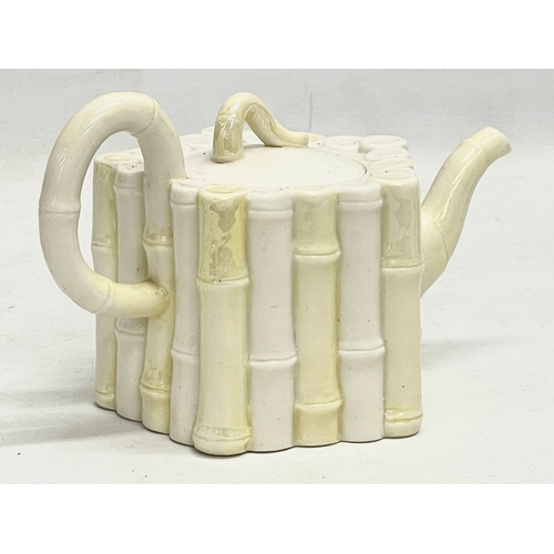 58 - A 1st Period Belleek Pottery Bamboo teapot. 21x12.5cm