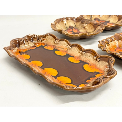 294 - 3 Mid Century glazed pottery serving trays. 28cm, 29cm, 31cm.