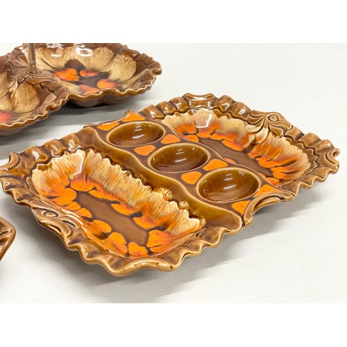 294 - 3 Mid Century glazed pottery serving trays. 28cm, 29cm, 31cm.