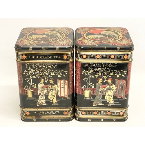 295 - A pair of large vintage tea tins. 17x17x25cm