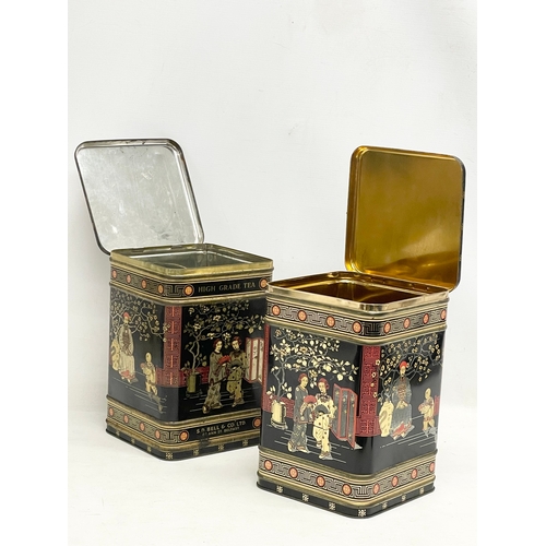 295 - A pair of large vintage tea tins. 17x17x25cm