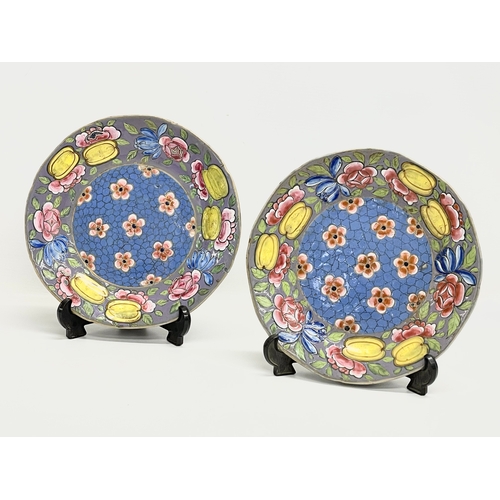 115 - A pair of 19th century continental Majolica hand painted plates. 22.5cm