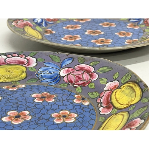 115 - A pair of 19th century continental Majolica hand painted plates. 22.5cm