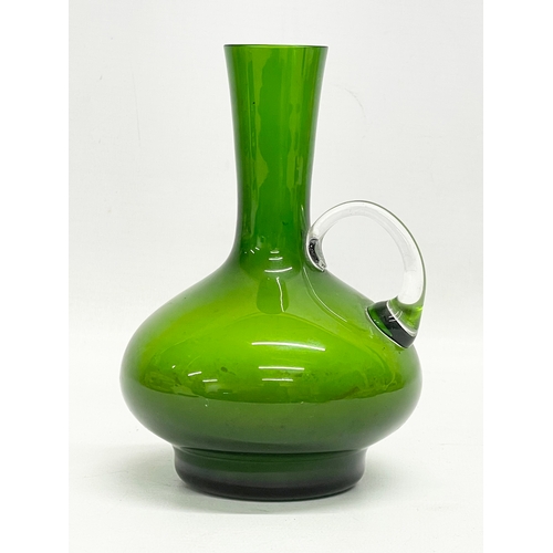 177 - A vintage Art Glass jug. 1940-1960. 11x15cm.