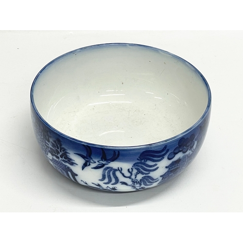 181 - A late 19th century Doulton Burslem ‘Willow’ pattern bowl. 20x9cm.