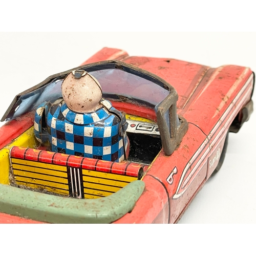 222 - A vintage tin plate Super 88 clown car. Japan. 18cm