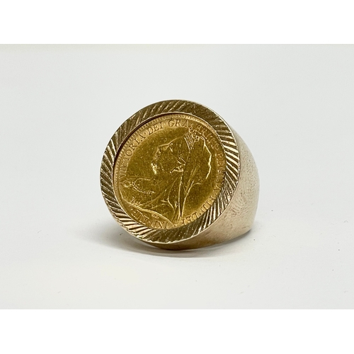 545 - A 9ct gold Victorian half sovereign ring. 1898. 11.25 grams total.