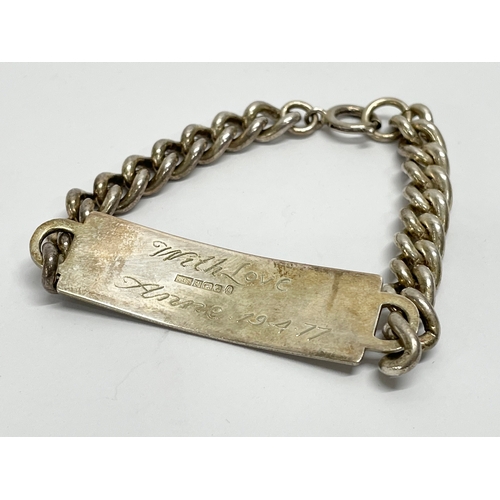 559 - A silver bracelet. 29.38 grams.