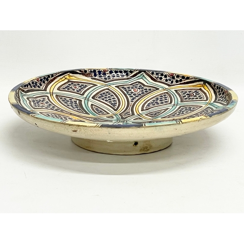 62 - A large 19th century Moroccan stoneware pottery bowl. 32.5x6.5cm