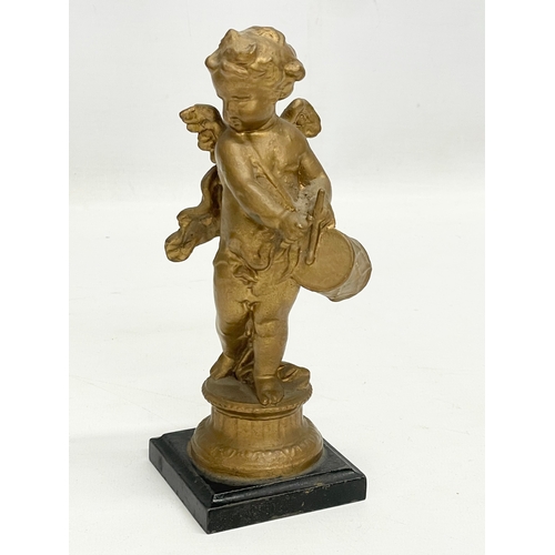 63 - A pair of mid to late 19th century gilt spelter cherub figures. 17.5cm