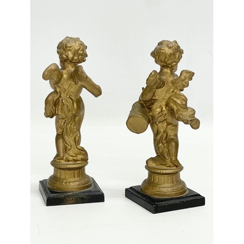 63 - A pair of mid to late 19th century gilt spelter cherub figures. 17.5cm