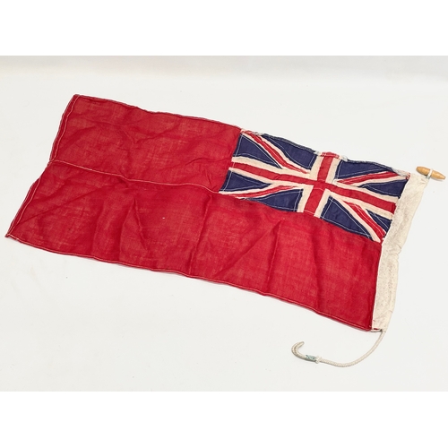 128 - A vintage Naval Union Jack. 65x34cm