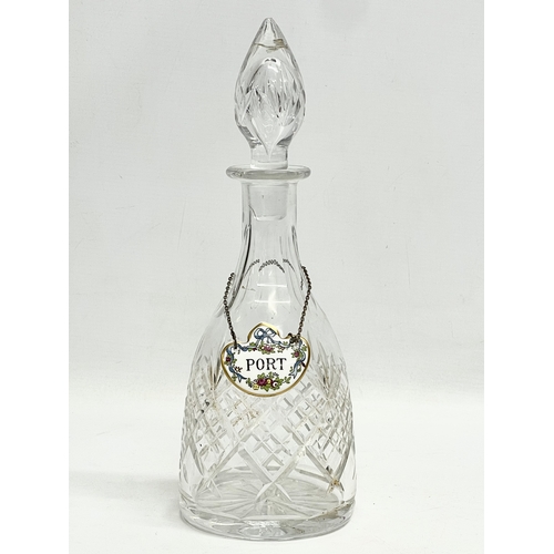 346 - A vintage crystal decanter with an enamel Port label by Coalport. 30cm