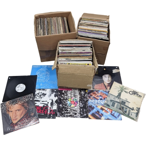 307 - A large collection of vintage vinyl records and LPs