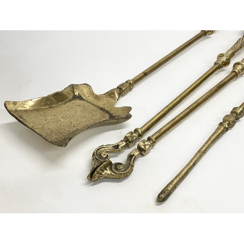 369 - 3 good quality Victorian heavy brass fire tools and a pair of vintage brass andirons. Tools measures... 