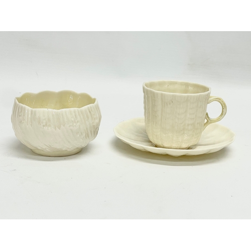 654 - A 2nd Period Belleek bowl and a 3rd Period Belleek cup and saucer.