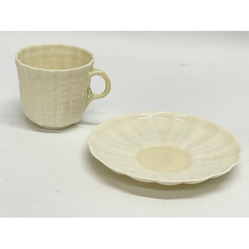 654 - A 2nd Period Belleek bowl and a 3rd Period Belleek cup and saucer.