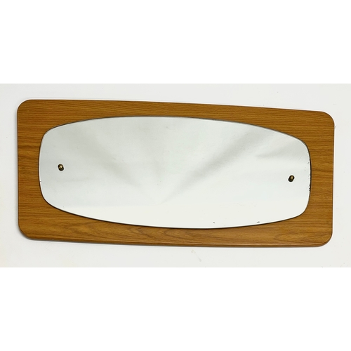 312 - A Mid Century mirror. 76x38cm