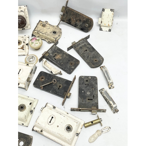 313 - A quantity of late 19th/early 20th century doors locks etc.