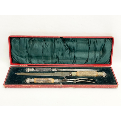 190 - A late 19th century silver plated and horn carving set. James Deakin & Sons. 46cm