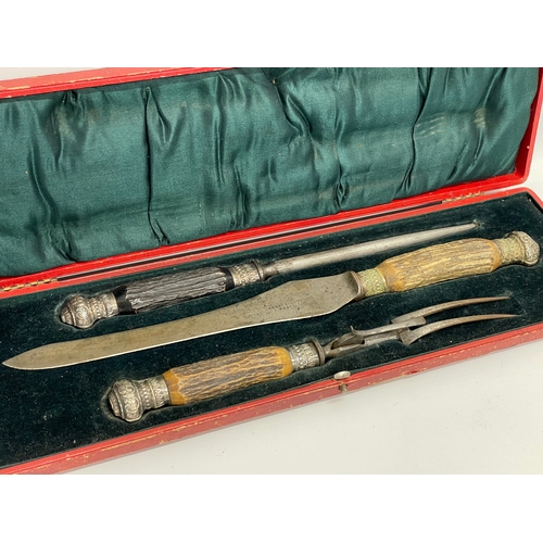 190 - A late 19th century silver plated and horn carving set. James Deakin & Sons. 46cm