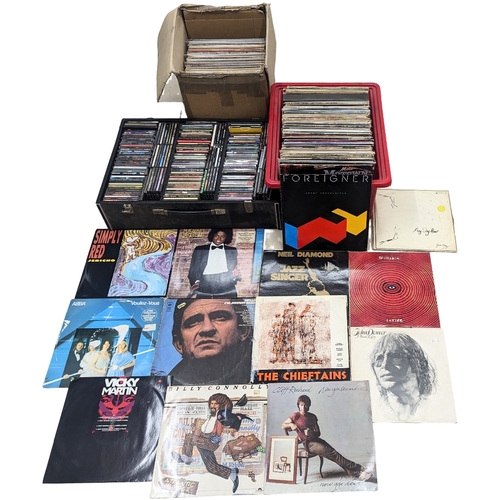 311 - A collection of vintage vinyl records and LPs, with a collection of CDs. Including Michael Jackson, ... 