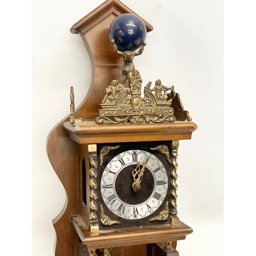 374 - A vintage Dutch wall clock. Weights and pendulum.