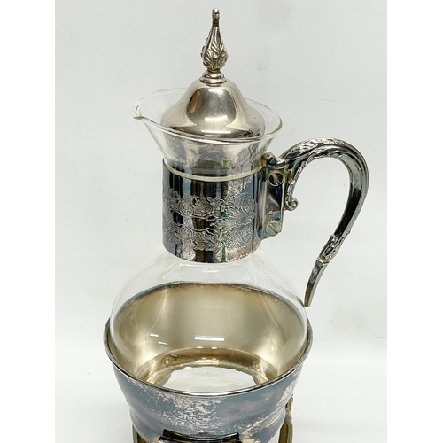 463 - A silver plated coffee carafe. 39.5cm